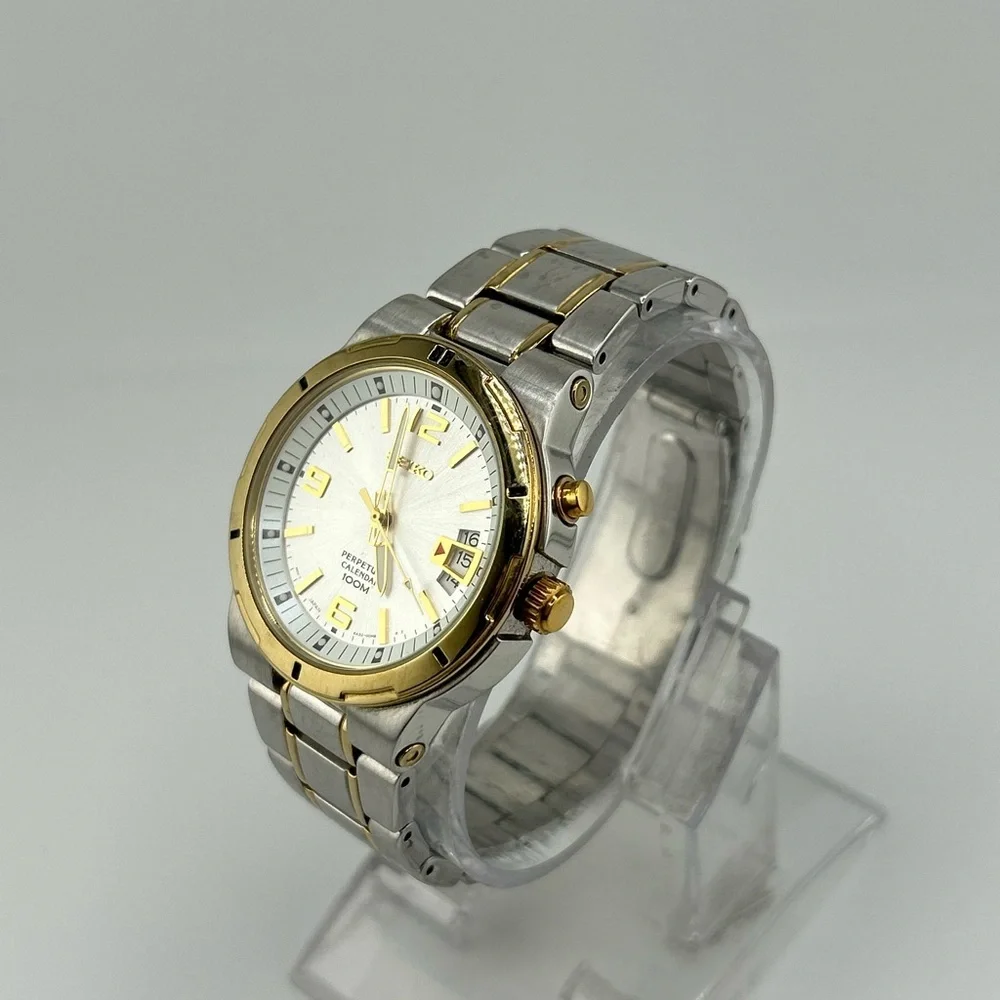 Seiko Men's SNQ076 Perpetual Calendar Two-Tone Watch #555